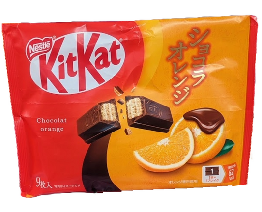 Japanese Kit Kat chocolate bar packaging with orange flavor on a white background