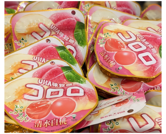 Several Japanese kororo white peach gummy packages