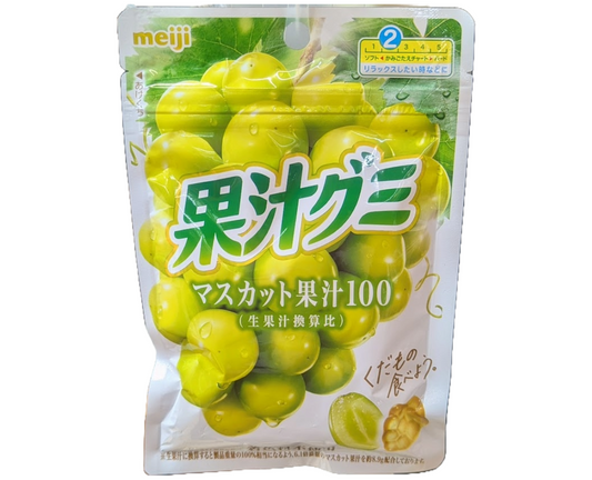Packaging of Japanese Meiji fruit gummies with muscat white grapes on a white background