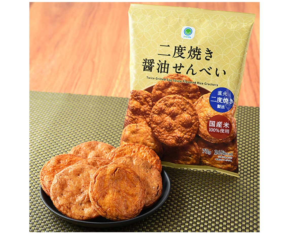 This traditional Japanese senbei (rice cracker) is baked twice over an open flame, giving it that wonderful soy sauce aroma that is so beloved throughout the country. Made with 100% domestic rice.  