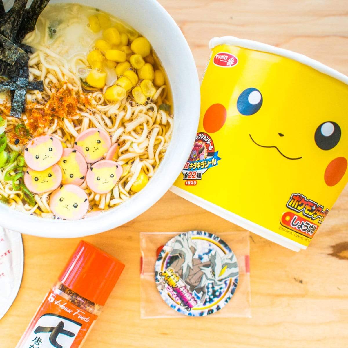 Your favorite anime is here, now with its own ramen! Shoyu (soy sauce) is one of the most famous ramen broths in Japan, and this one comes with green onions, corn, and little Pikachu kamaboko (fish cakes) inside! And on top of that, it even comes with a special Pokémon collector's sticker inside. Pikachu gives his stamp of approval!    